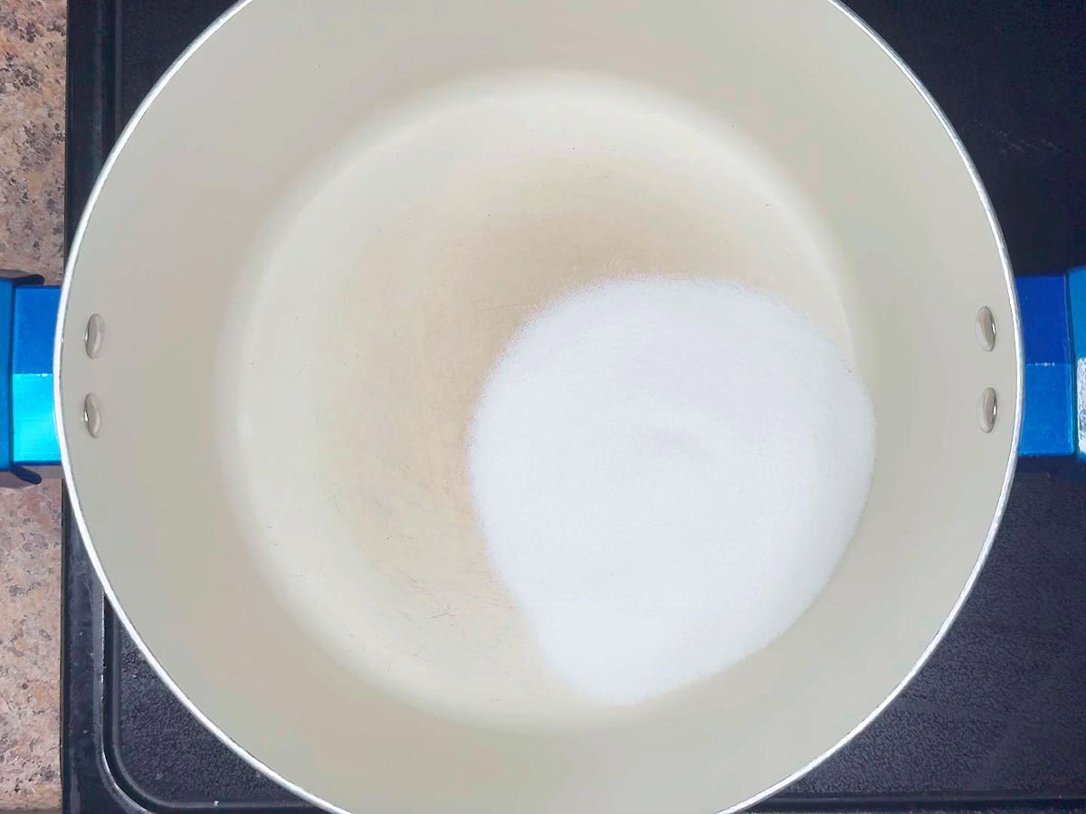 Sugar added to a stockpot.