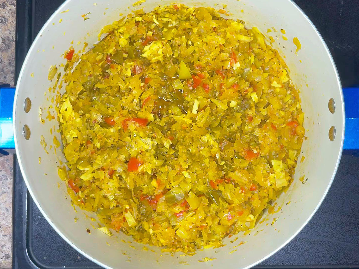 Green tomato chow chow in a stock pot after it has simmered for 45-60 minutes.