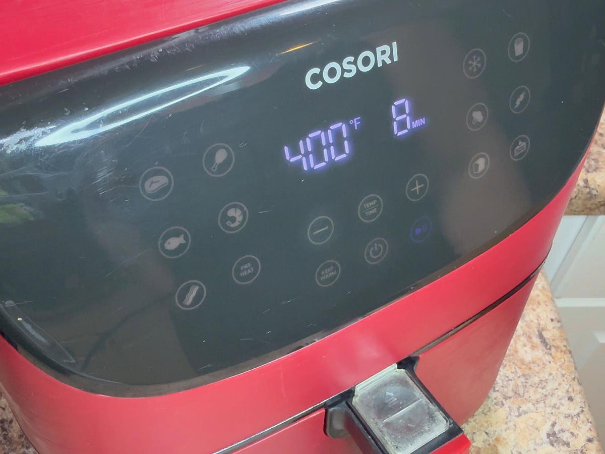 Air fryer display showing 400 degrees F for eight minutes.