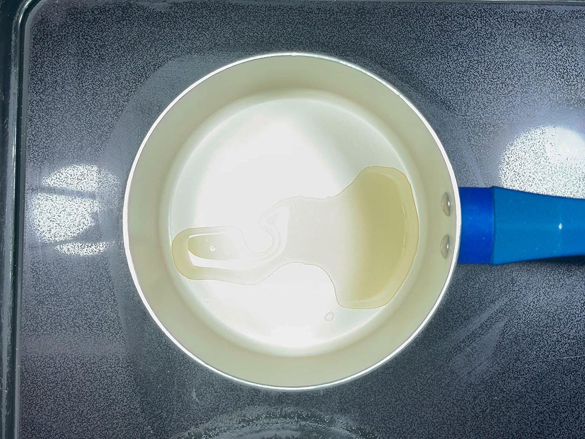 Apple cider vinegar in a saucepan.