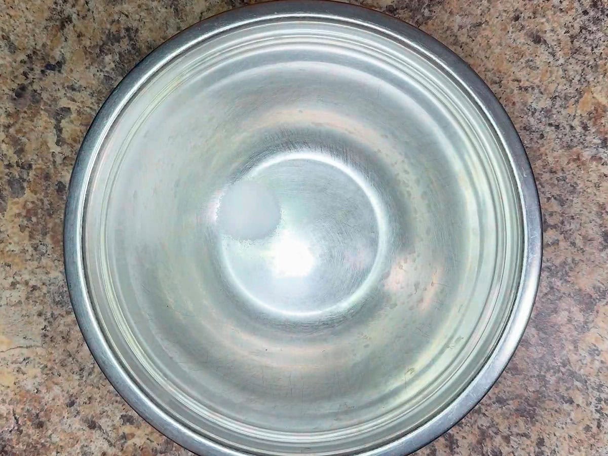 Salt in a large mixing bowl.