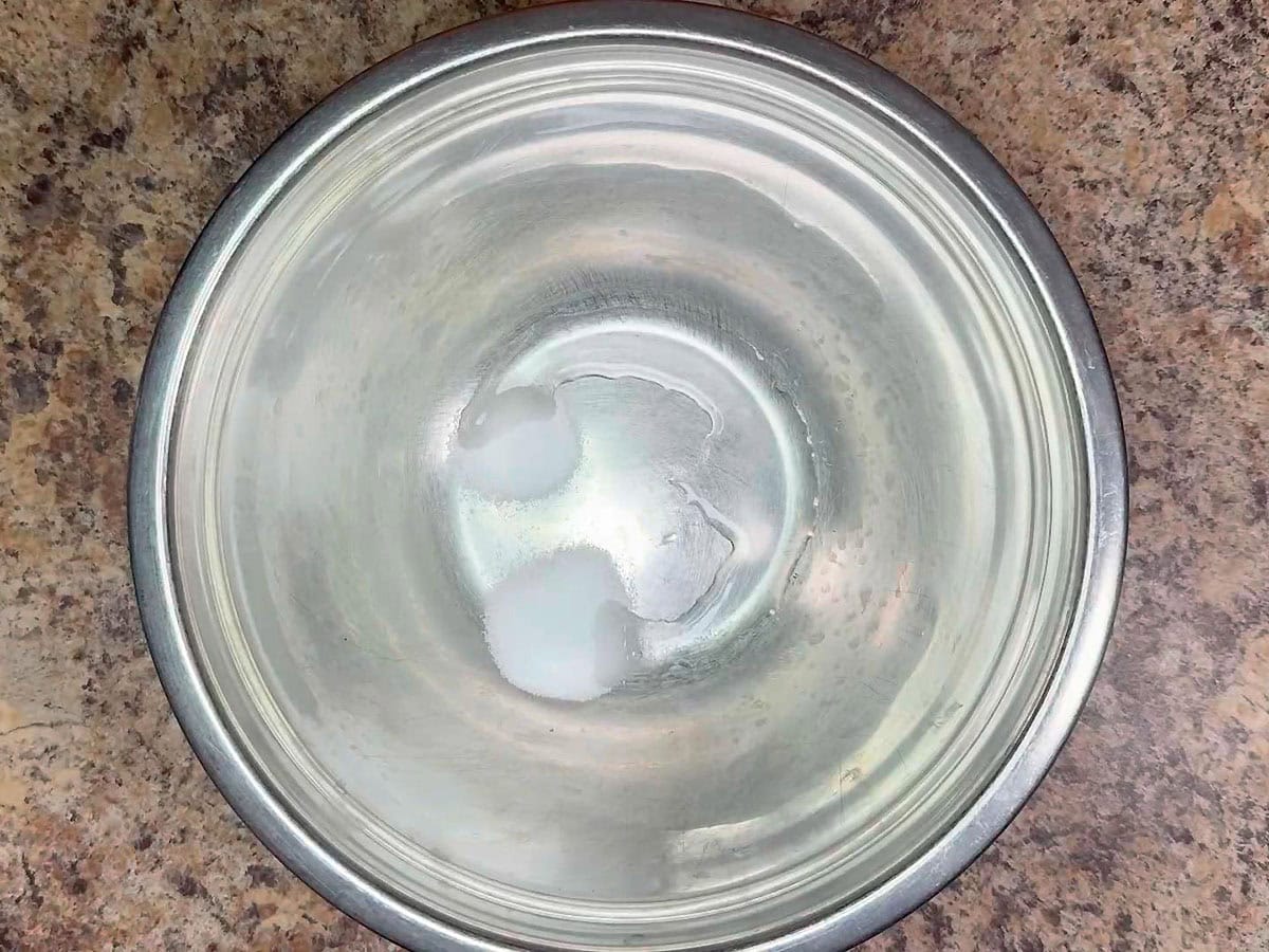 Salt, sugar and vinegar in a large mixing bowl.