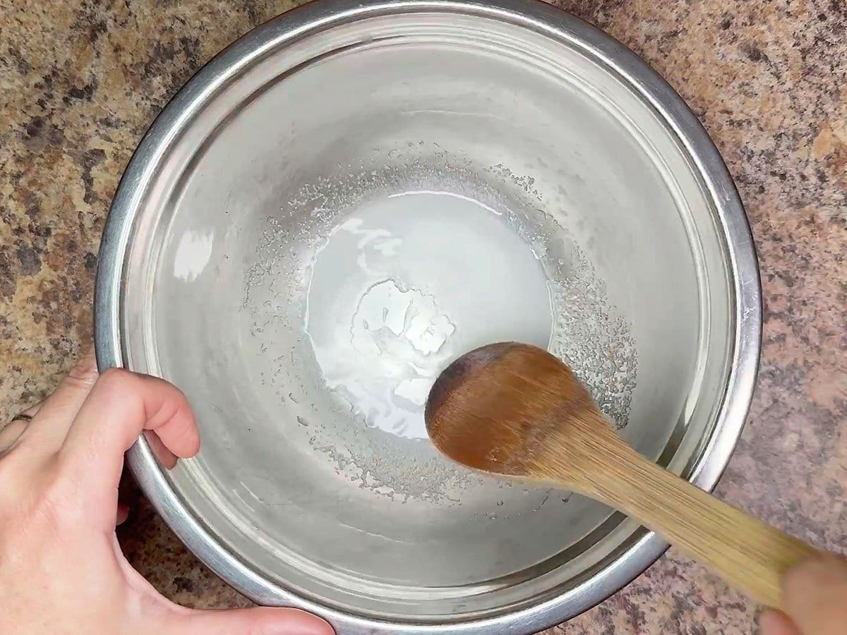 Mixing the salt, sugar and vinegar together.