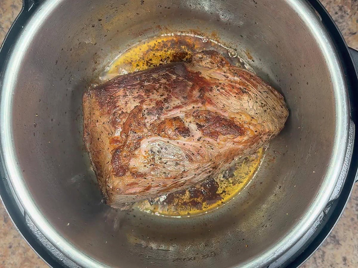 Seared chuck roast in the Instant Pot.