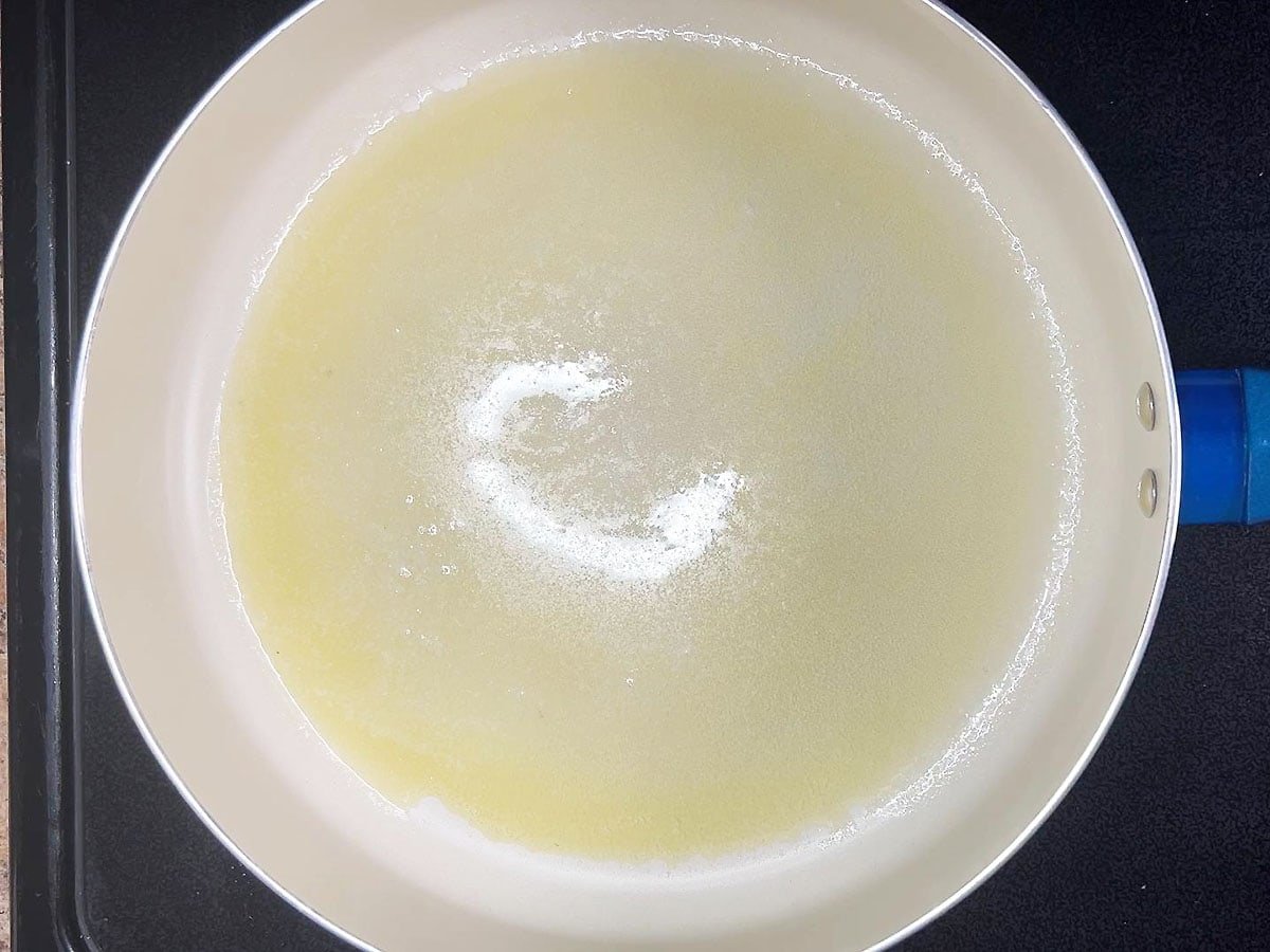 Melted butter in a skillet.
