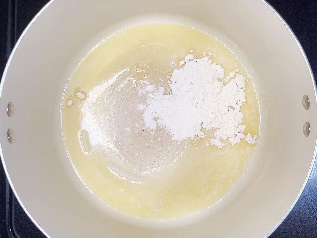 Flour added to the melted butter in a large stock pot.
