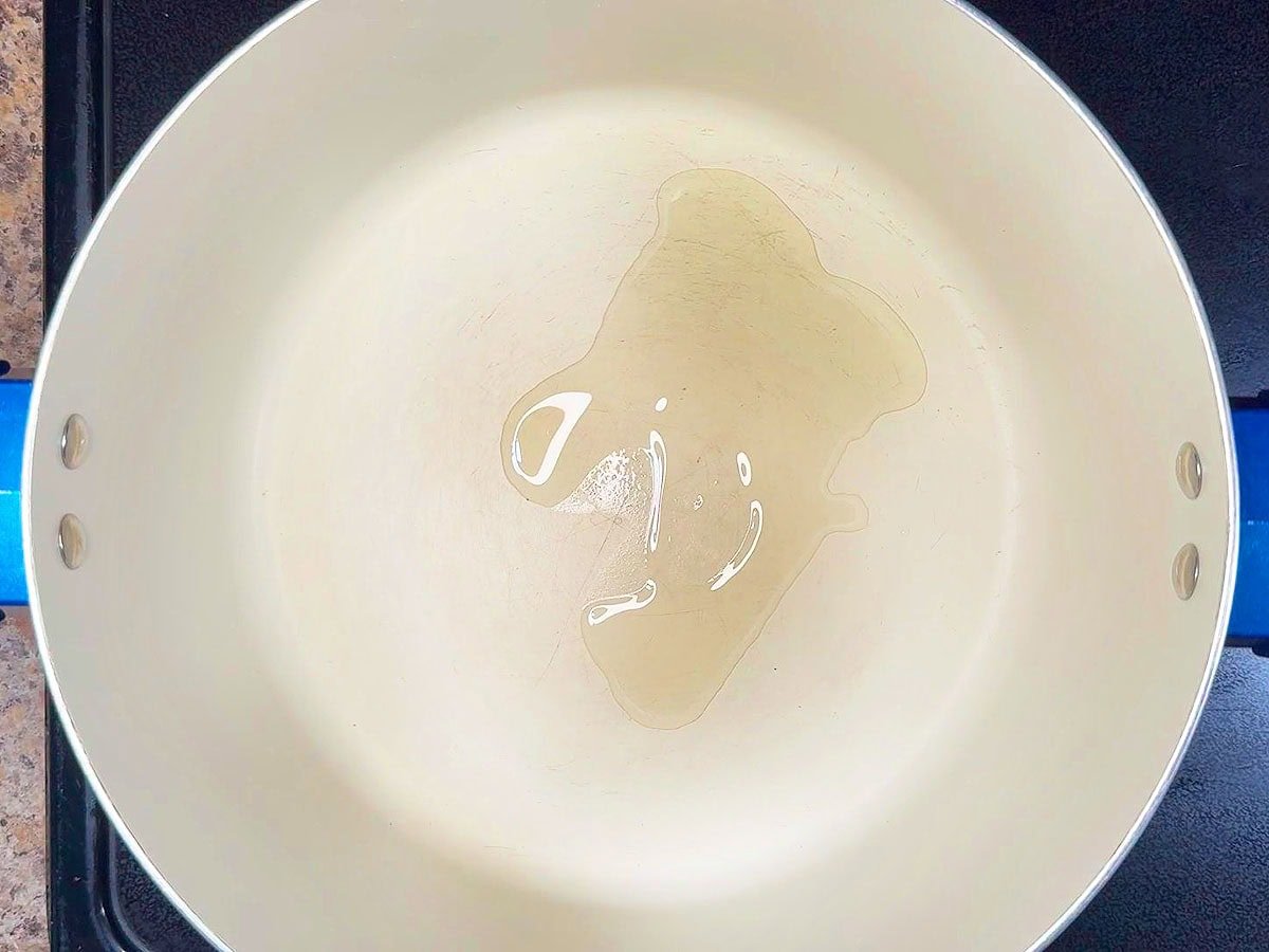 Heating oil in a large stockpot.