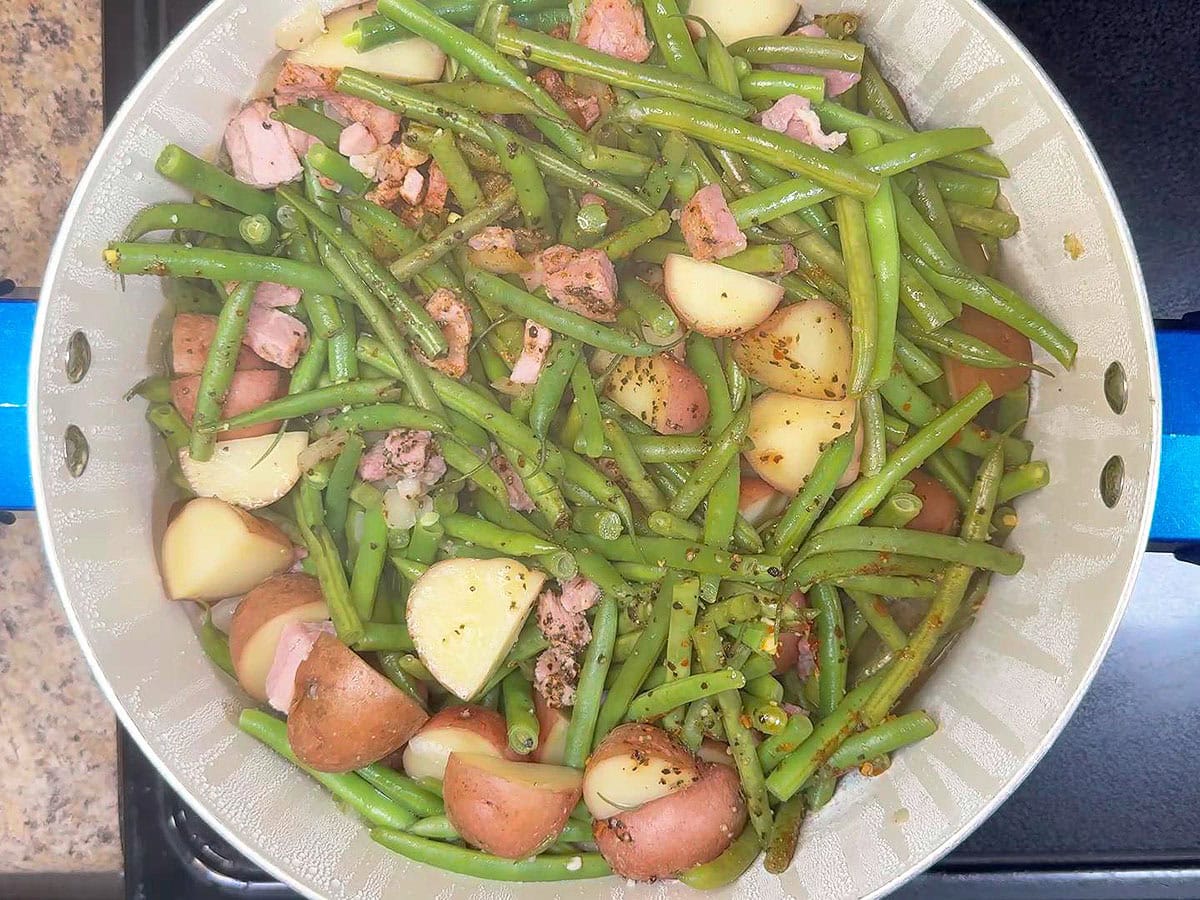 Green beans and potatoes after they have simmered for 40 minutes.