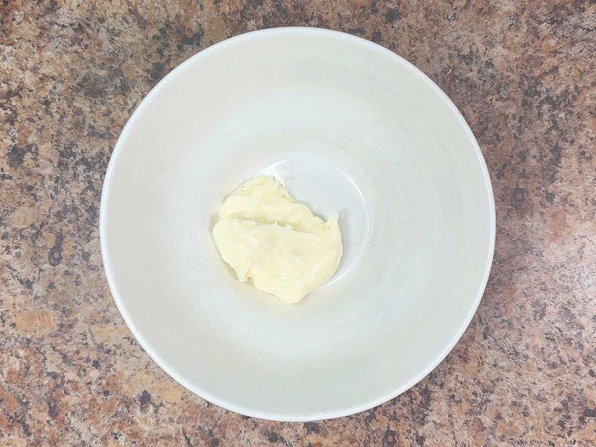 Mayonnaise in a mixing bowl.