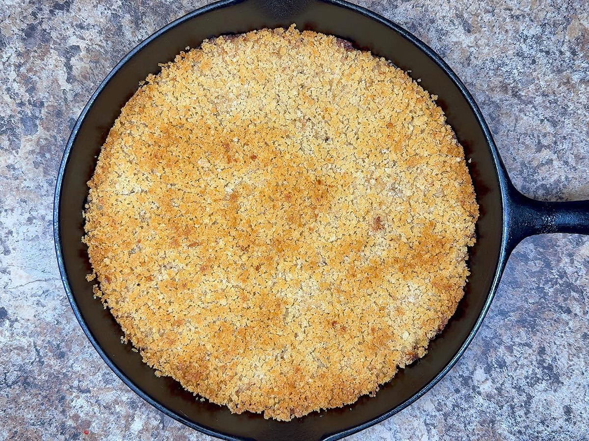 Mashed cauliflower and cheese casserole baked until the breadcrumbs are toasted.