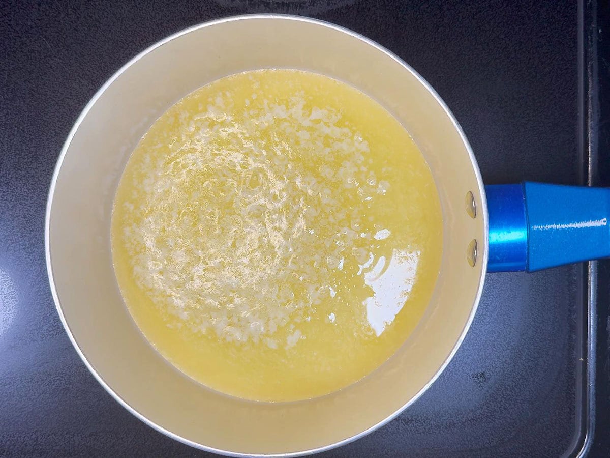 Melted butter in a small saucepan.