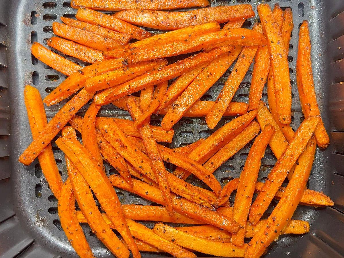 Carrots after they have roasted in the air fryer for 10 minutes.