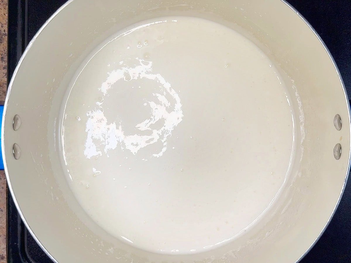 Melted marshmallows in a large stock pot.