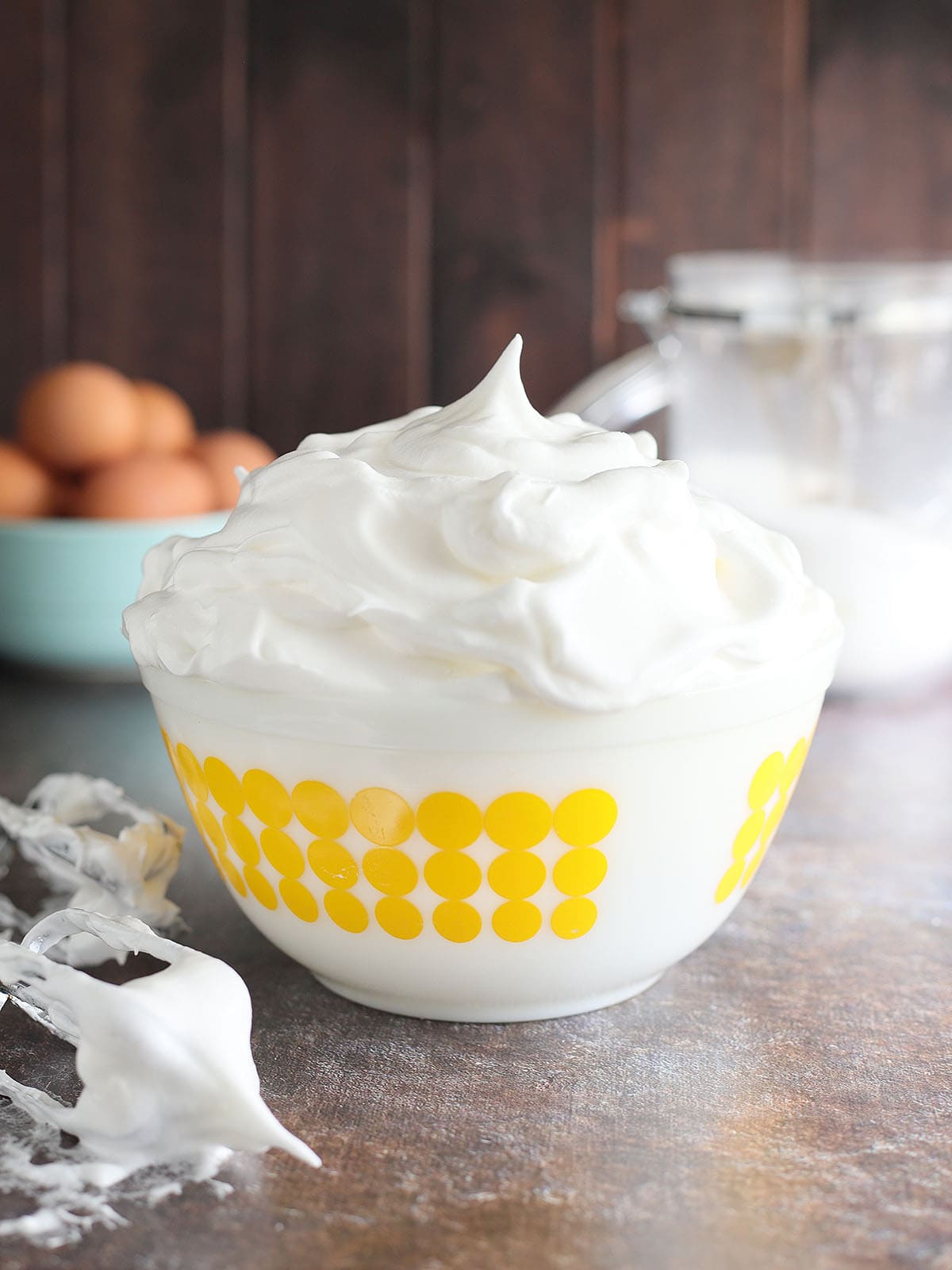 Pie meringue piled high in a mixing bowl.