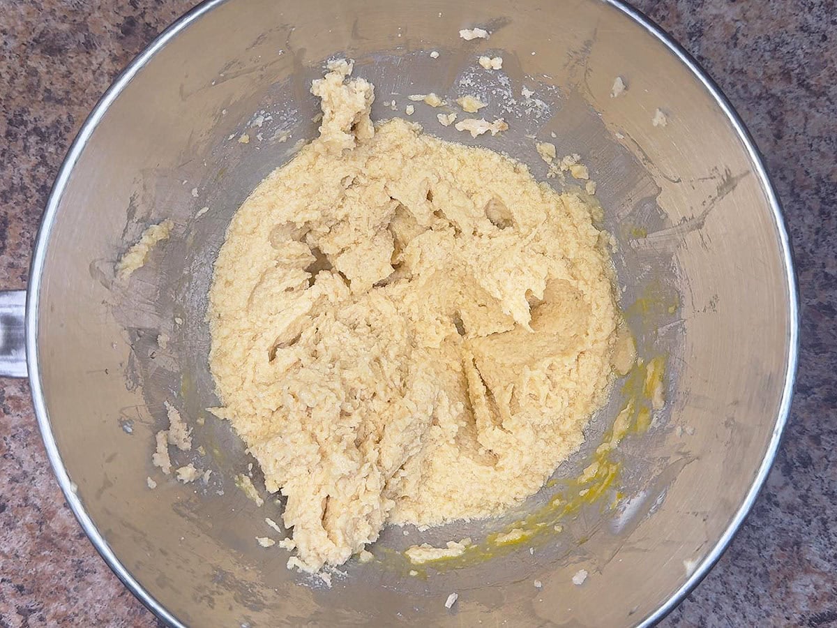 Cookie dough after eggs and vanilla have been added to the creamed butter and sugar.