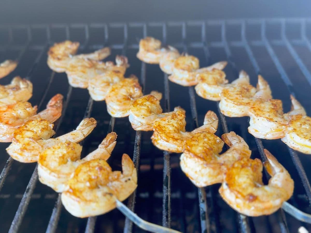 Skewered shrimp on the grill.