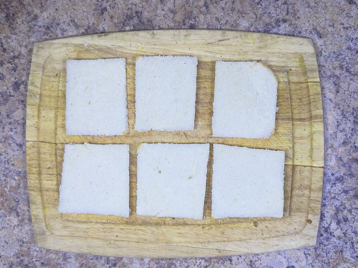 White bread slices with the crusts removed.