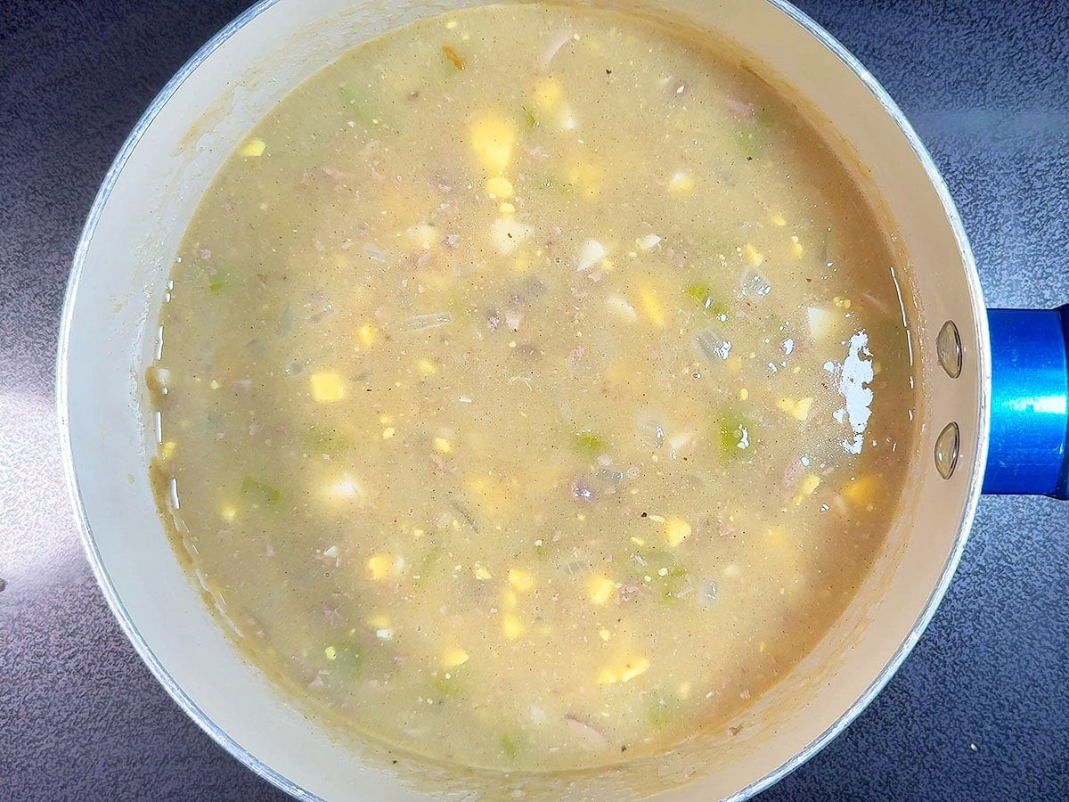 Giblet gravy with giblet meat, neck meat, and hardboiled eggs added in.