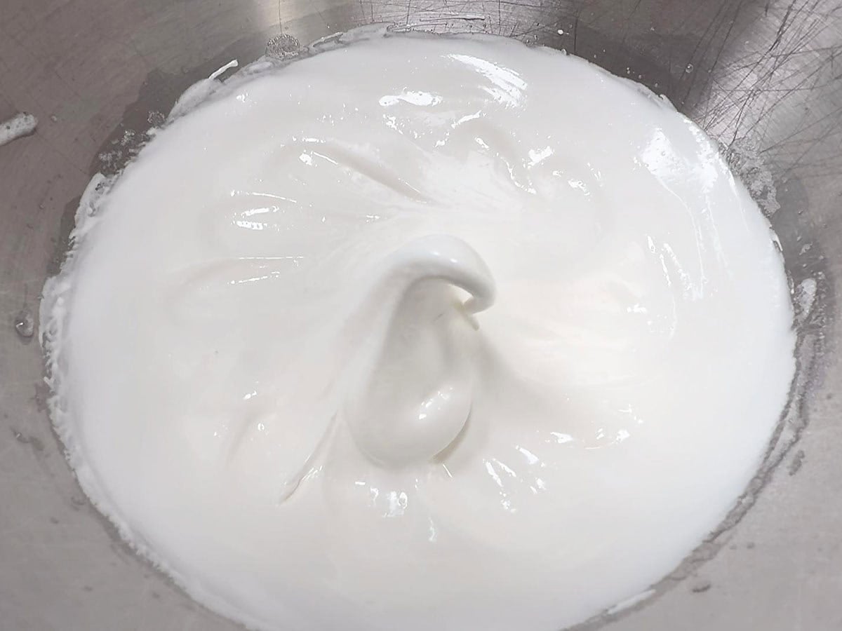 Egg whites and sugar beaten until glossy and soft peaks form.